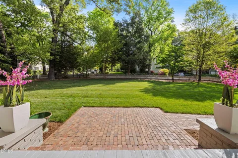 a garden view with a seating space