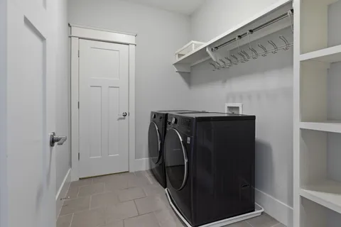 a utility room with cabinets