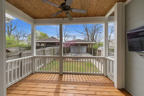 a view of a balcony with a potted plant