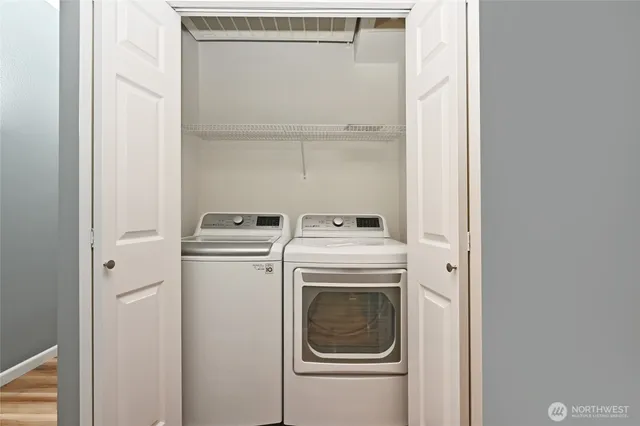 a utility room with dryer and washer