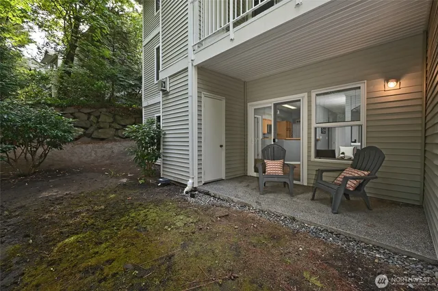 a backyard of a house with seating space