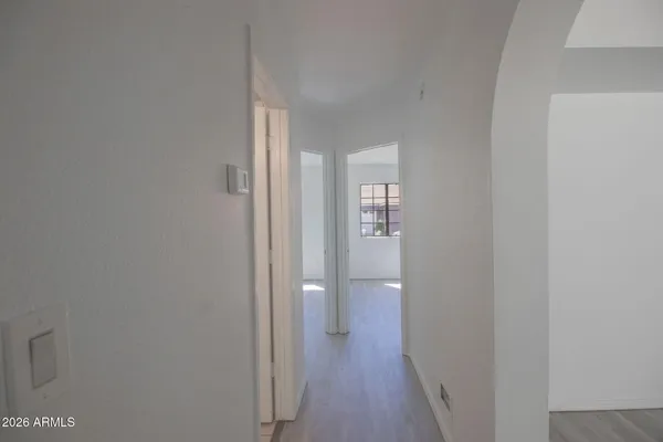 a view of a bathroom from the hallway
