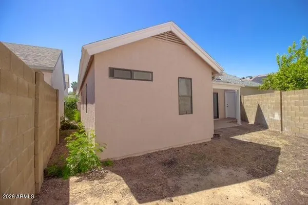 a house view with a backyard