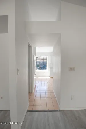 a view of an empty room and window