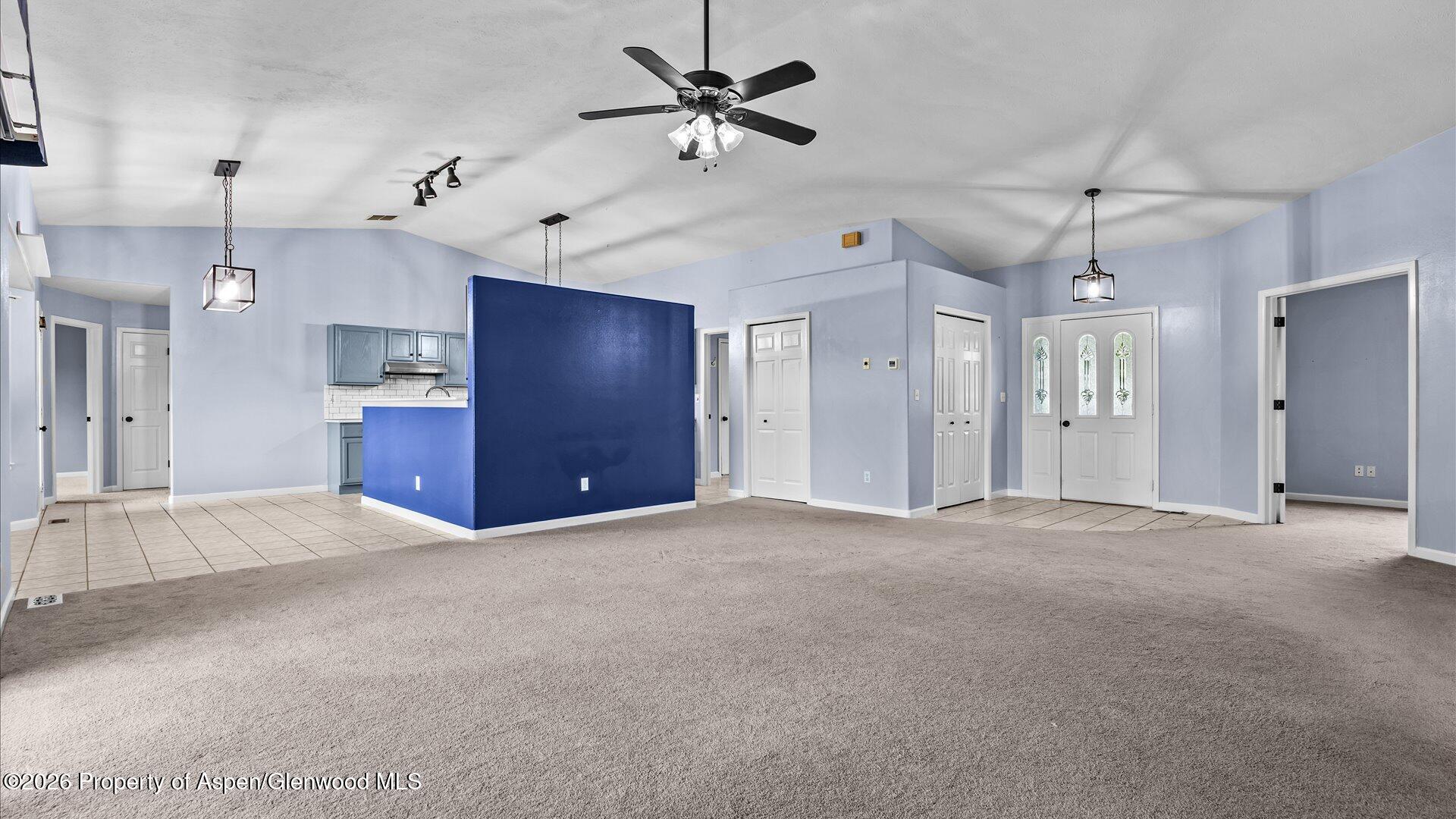 1459 Anvil View Avenue Rifle, CO 81650 - Photo 5 of 29 a view of an empty room with a ceiling fan