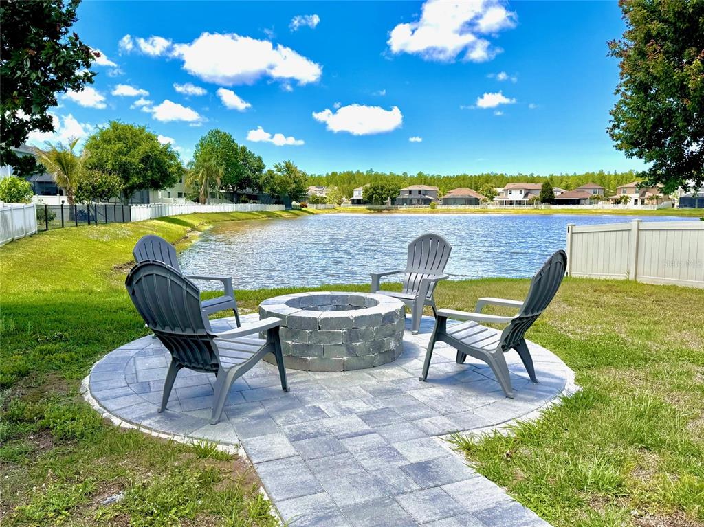 Gorgeous corner pond view of the largest pond in the community!