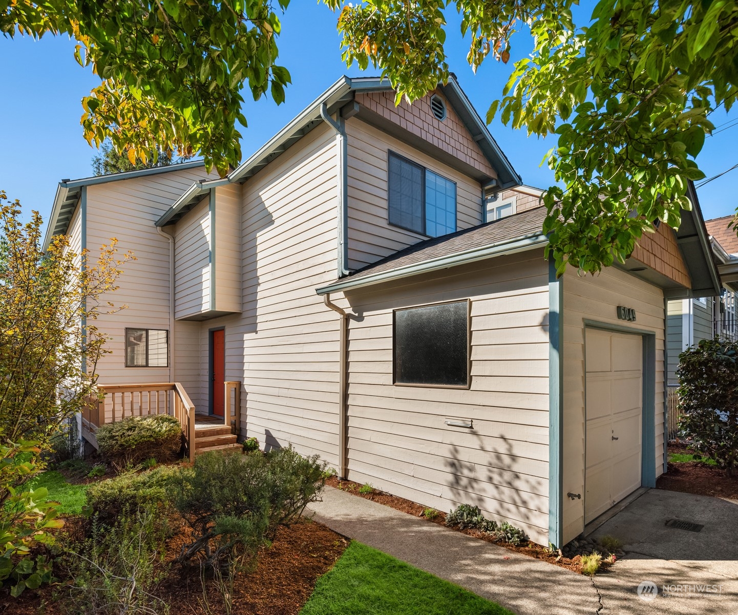 6049 5th Avenue Northwest Seattle, WA 98107 - Photo 1 of 22 a view of a house with a yard