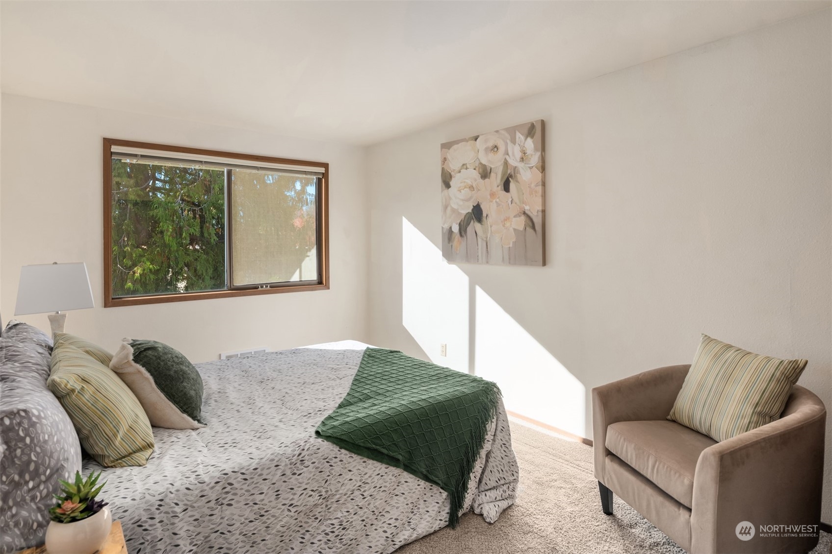 6049 5th Avenue Northwest Seattle, WA 98107 - Photo 15 of 22 a bedroom with a bed and a couch