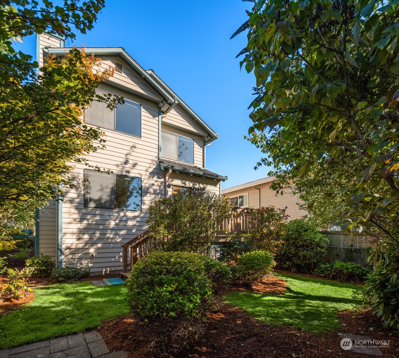 6049 5th Avenue Northwest Seattle, WA 98107 - Photo 20 of 22 a view of a house with a yard