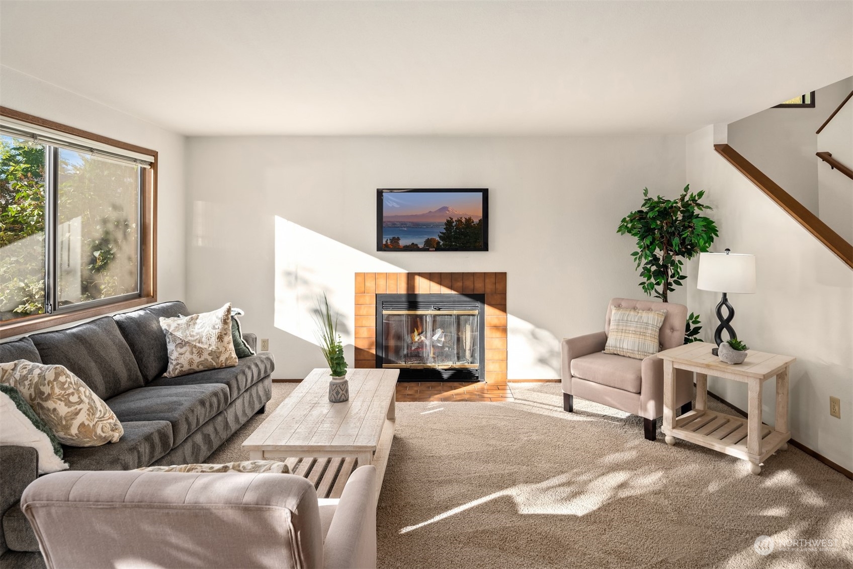 6049 5th Avenue Northwest Seattle, WA 98107 - Photo 4 of 22 a living room with furniture and a fireplace