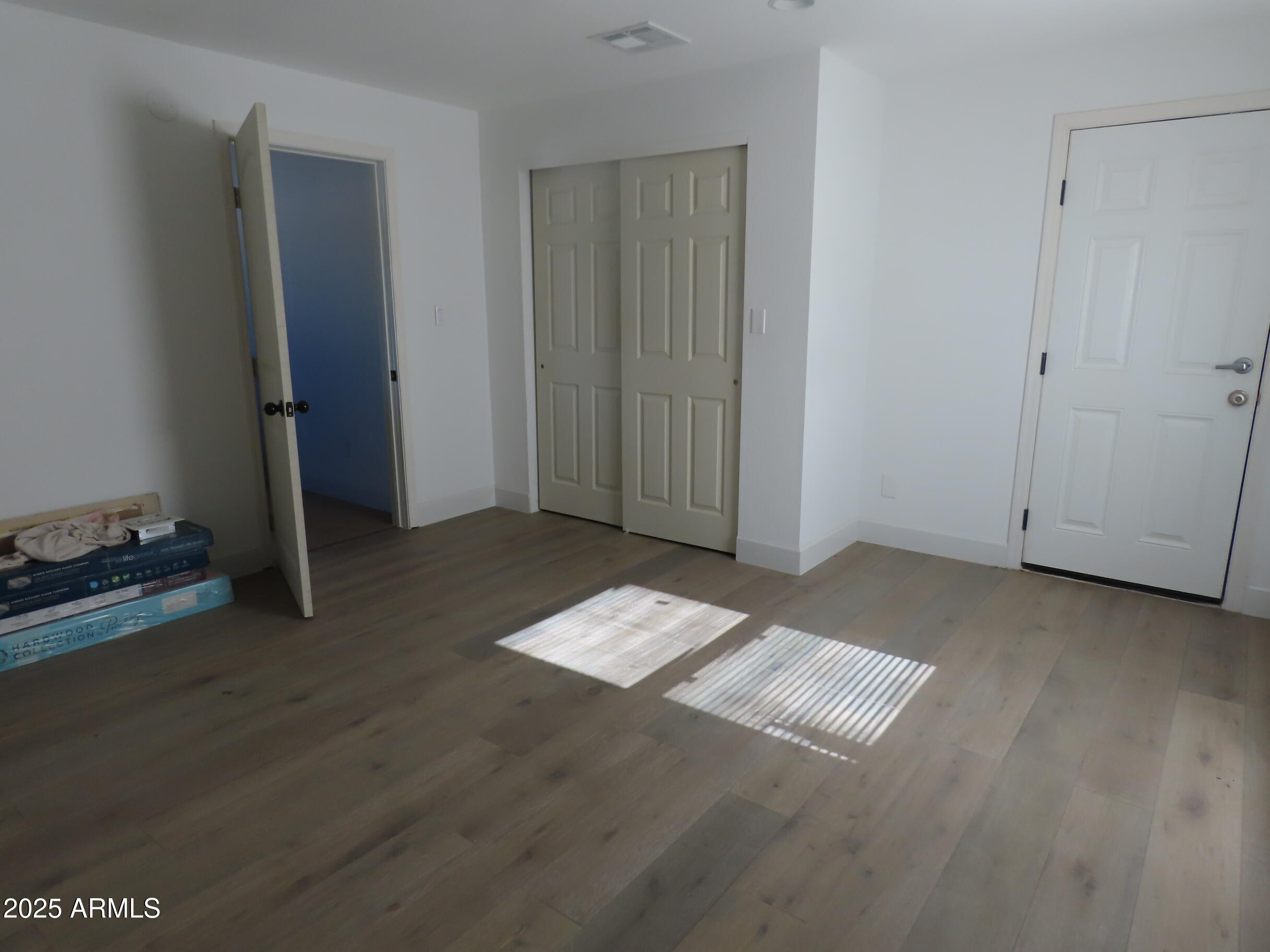 315 West Wight Street Superior, AZ 85173 - Photo 15 of 17 a view of workspace with wooden floor