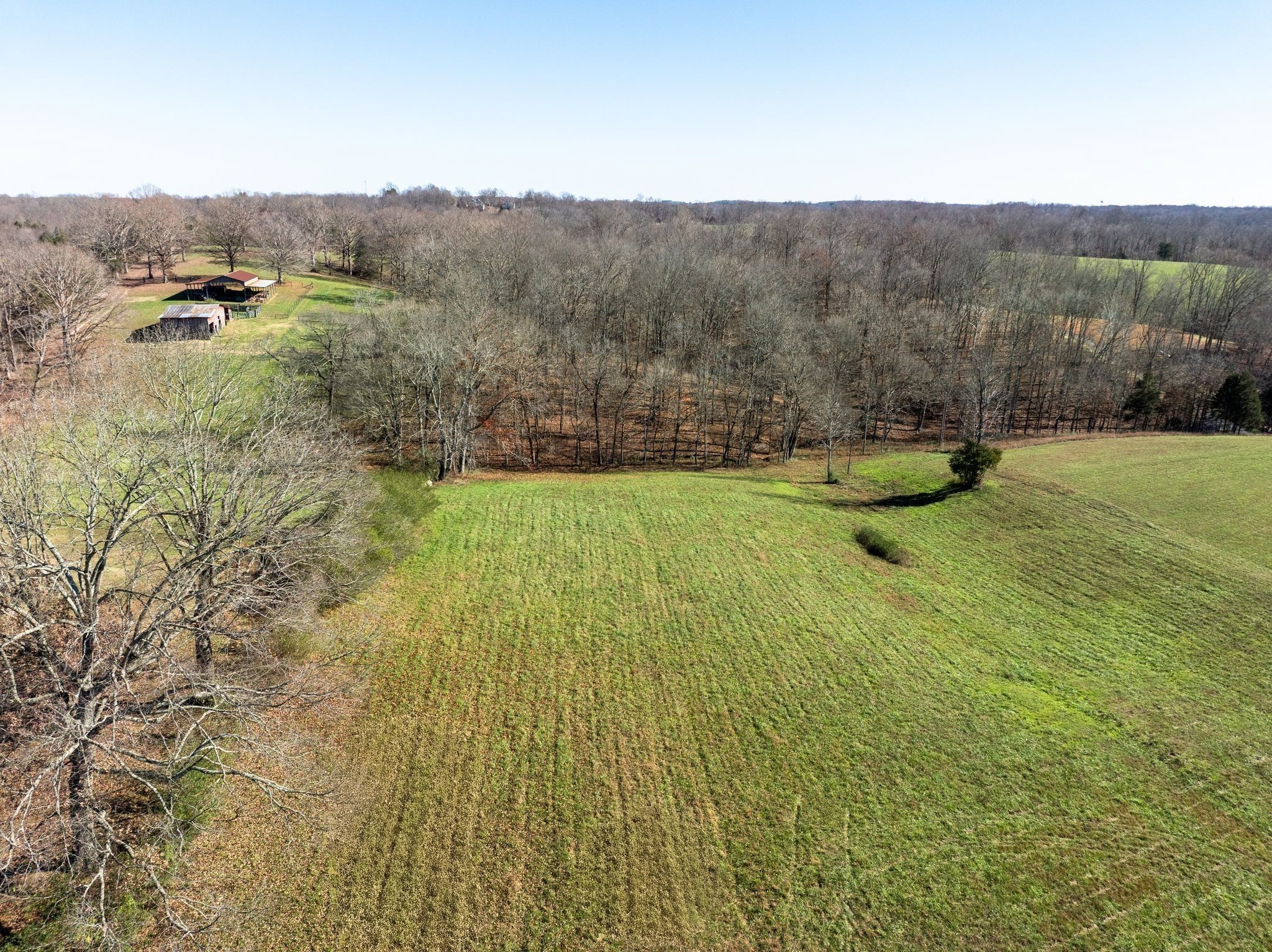 1087 Cowan Road Dickson, TN 37055 - Photo 3 of 8 a view of a lake with mountains in the background