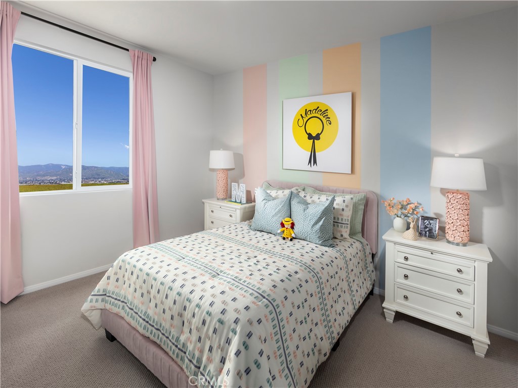 934 Fuchsia Circle Redlands, CA 92374 - Photo 4 of 16 Photo is not of the actual home, but is an inspirational photo of builder’s model home and may depict options, furnishings, and/or decorator features that are not included