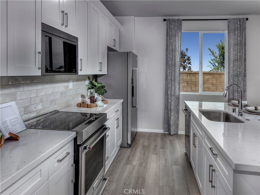 934 Fuchsia Circle Redlands, CA 92374 - Photo 10 of 16 Photo is not of the actual home, but is an inspirational photo of builder’s model home and may depict options, furnishings, and/or decorator features that are not included