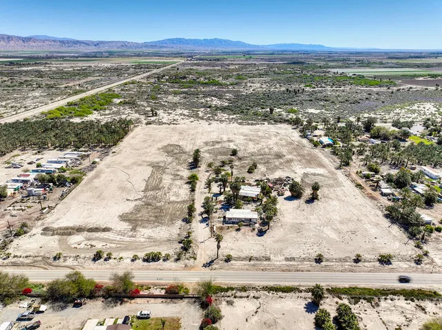 a view of a swimming pool with an ocean view