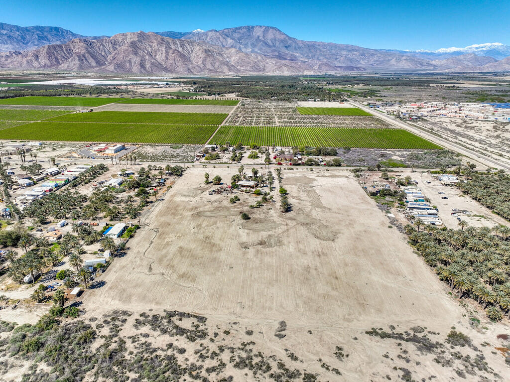 66350 Martinez Road Thermal, CA 92274 - Photo 25 of 68 a view of a swimming pool with a lake view