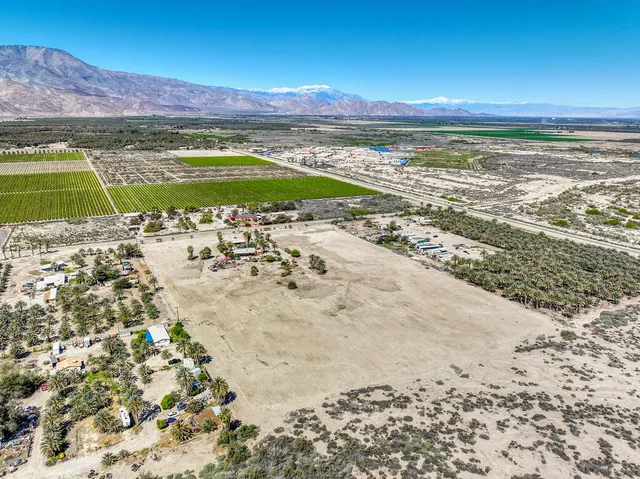 a view of an ocean and a mountain