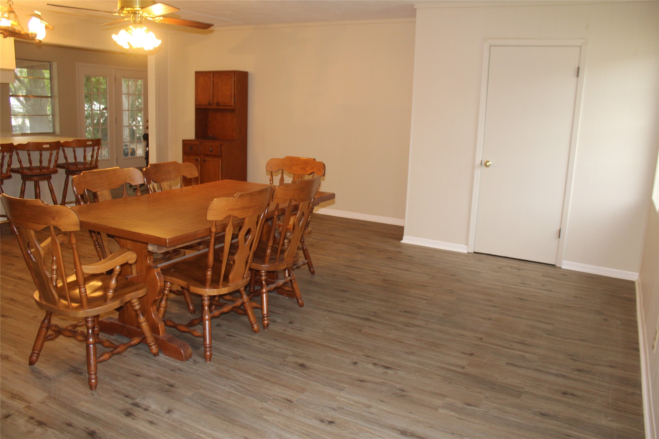 708 1st Street Winnie, TX 77665 - Photo 11 of 35 a view of a dining room with furniture and wooden floor
