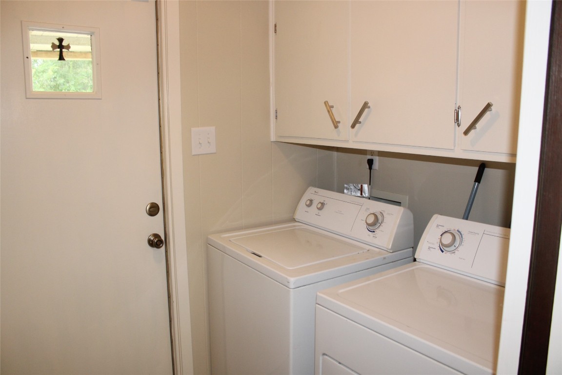708 1st Street Winnie, TX 77665 - Photo 15 of 35 a utility room with dryer and washer