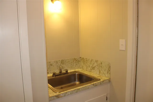 a view of utility room and sink