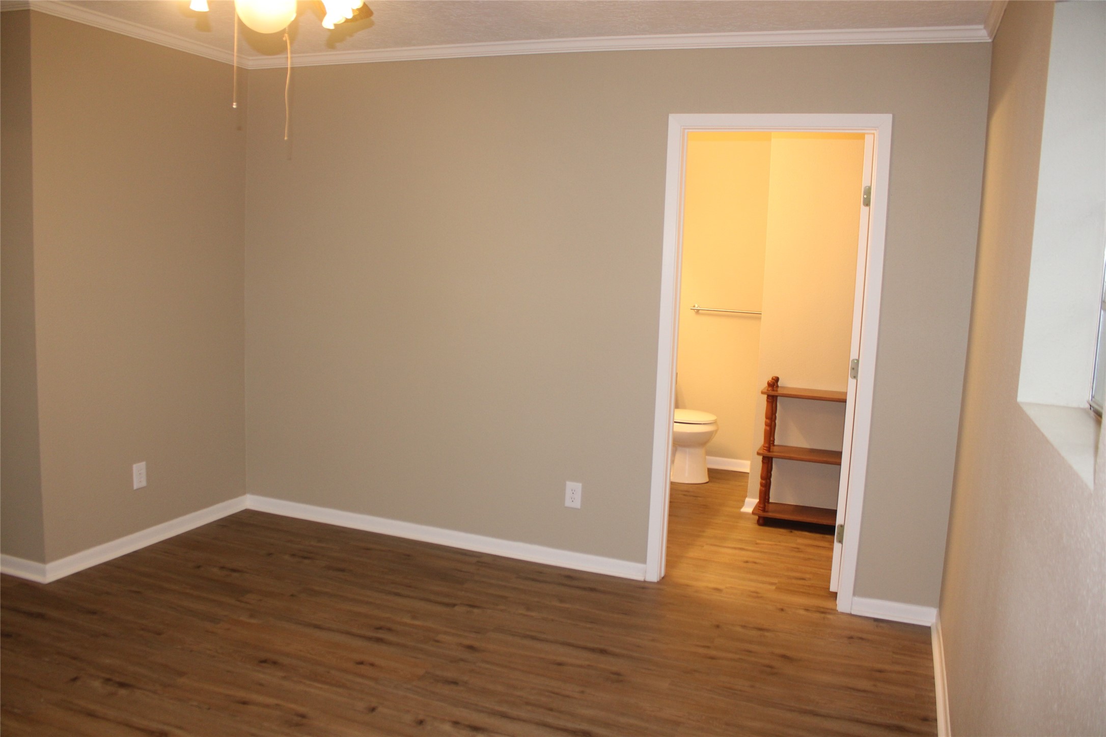 708 1st Street Winnie, TX 77665 - Photo 20 of 35 a view of a room with wooden floor and a sink