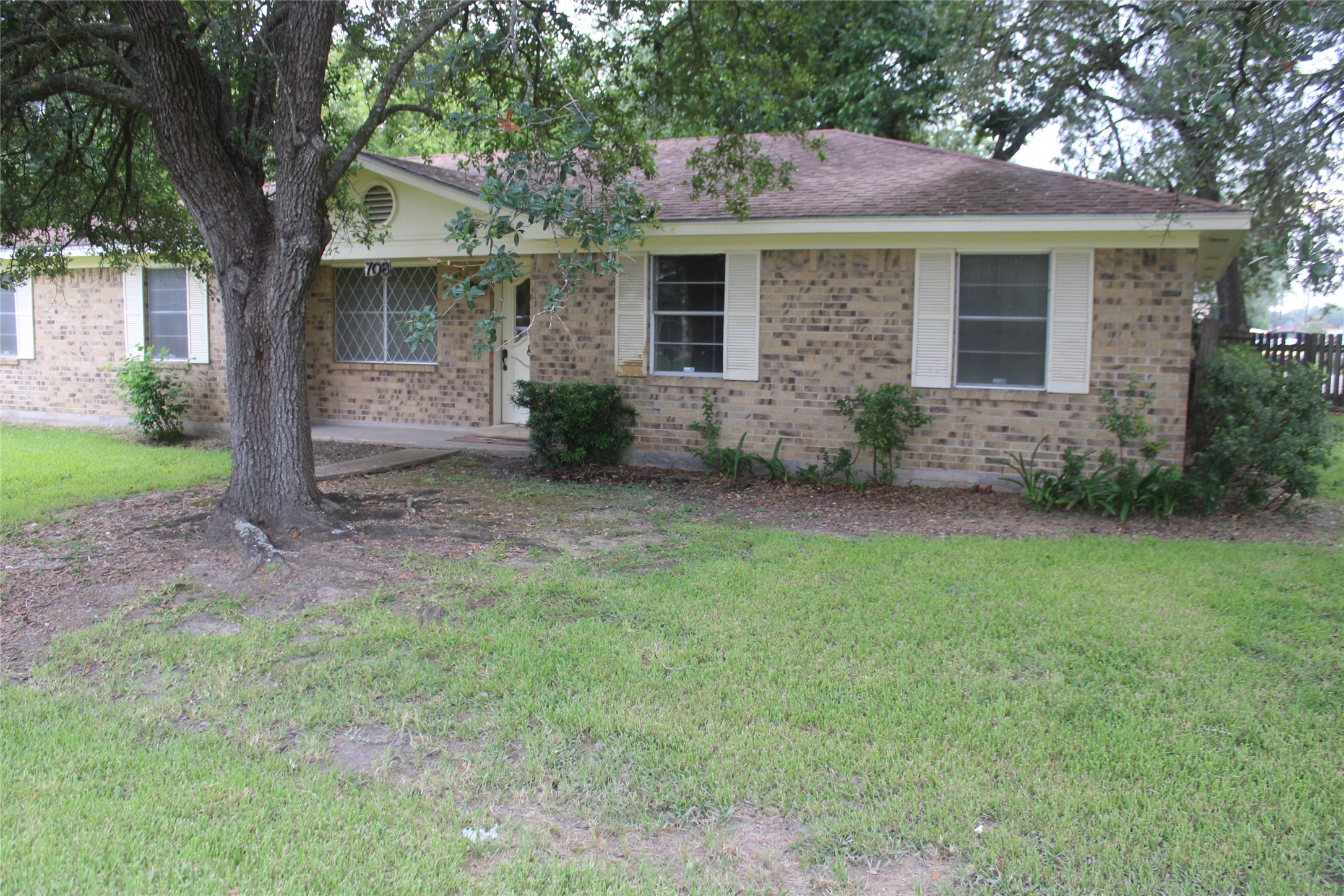 708 1st Street Winnie, TX 77665 - Photo 2 of 35 a front view of house with yard and green space