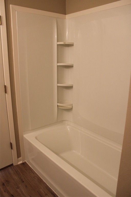 708 1st Street Winnie, TX 77665 - Photo 29 of 35 a bathroom with a bathtub