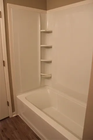 a bathroom with a bathtub