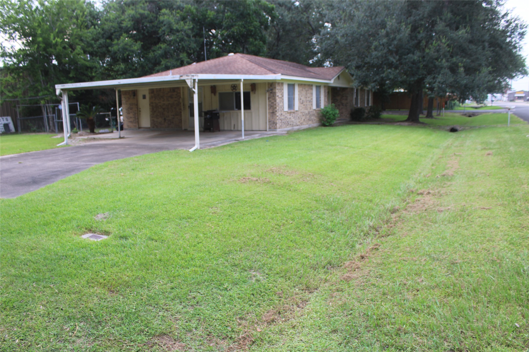 708 1st Street Winnie, TX 77665 - Photo 31 of 35 a view of a house with a yard porch and sitting area