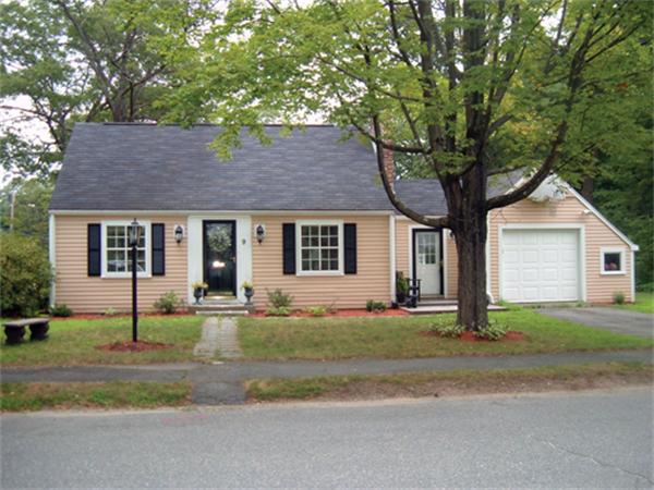 9 Leland Road Natick, MA 01760 - Photo 1 of 11 a front view of a house with a yard