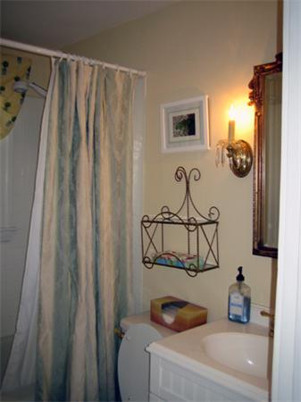 9 Leland Road Natick, MA 01760 - Photo 11 of 11 a bathroom with a sink vanity and tub