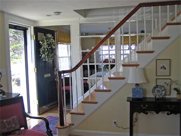 9 Leland Road Natick, MA 01760 - Photo 7 of 11 a view of entryway and hall with wooden floor