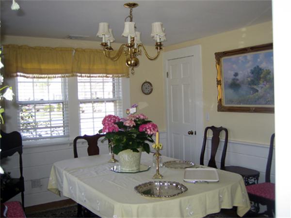 9 Leland Road Natick, MA 01760 - Photo 8 of 11 a view of a dining room with furniture and window