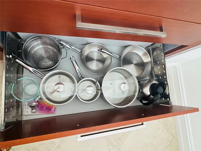 a view of a livingroom with furniture and a flat screen tv
