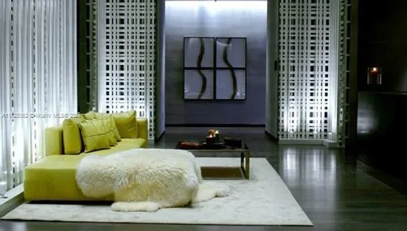 closeup of a sink with a mirror and vanity