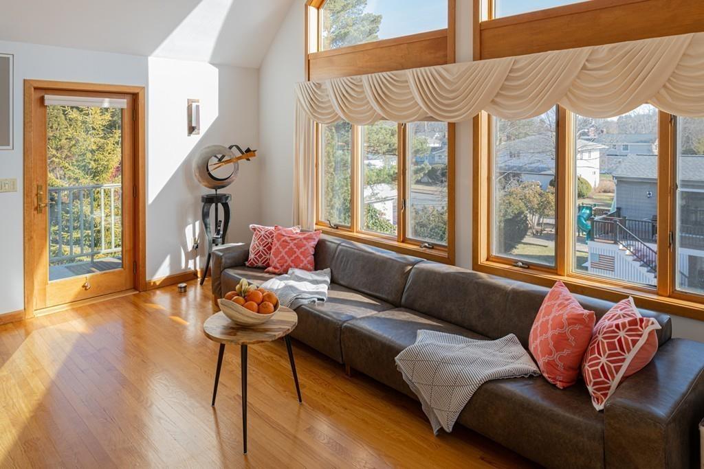 13 McKinley Road Marblehead, MA 01945 - Photo 11 of 36 a living room with furniture and a large window