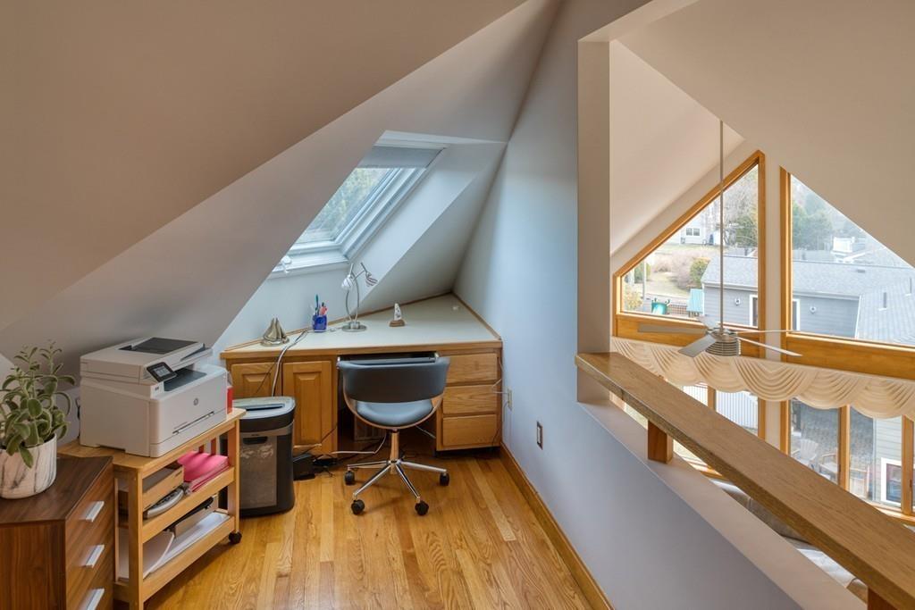 13 McKinley Road Marblehead, MA 01945 - Photo 15 of 36 a view of a room with wooden floor and furniture