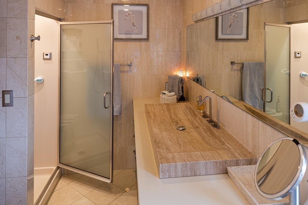 13 McKinley Road Marblehead, MA 01945 - Photo 18 of 36 a bathroom with a tub and shower