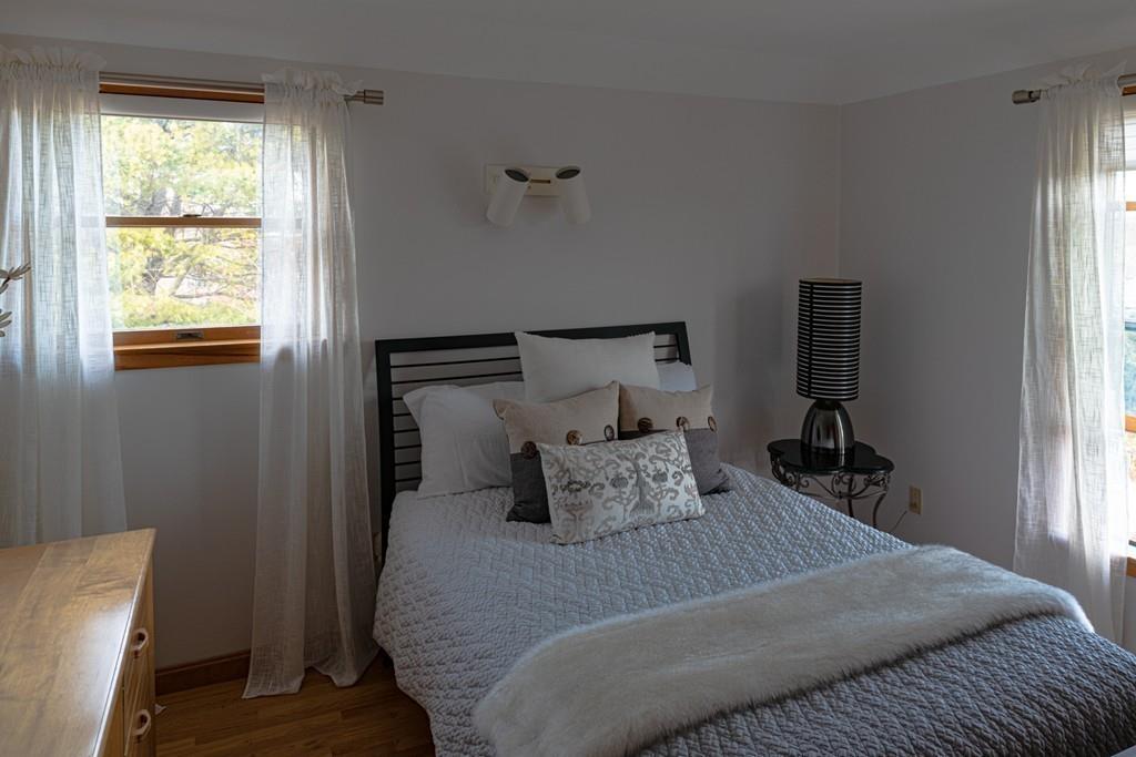 13 McKinley Road Marblehead, MA 01945 - Photo 23 of 36 a bedroom with a bed and window
