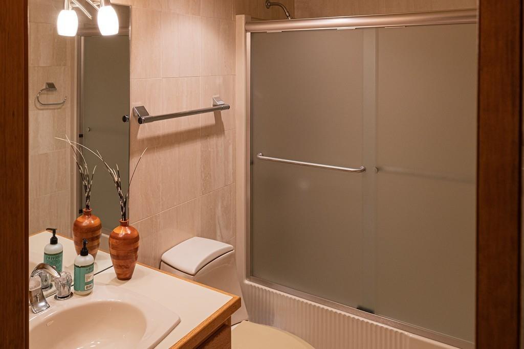 13 McKinley Road Marblehead, MA 01945 - Photo 26 of 36 a bathroom with a sink and shower