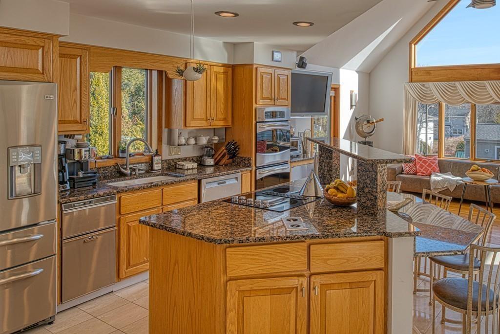 13 McKinley Road Marblehead, MA 01945 - Photo 10 of 36 a kitchen with sink refrigerator and cabinets