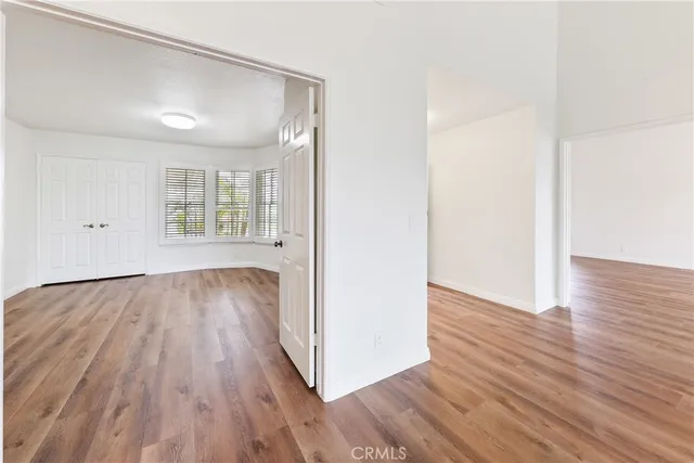 a view of a bathroom from a hallway