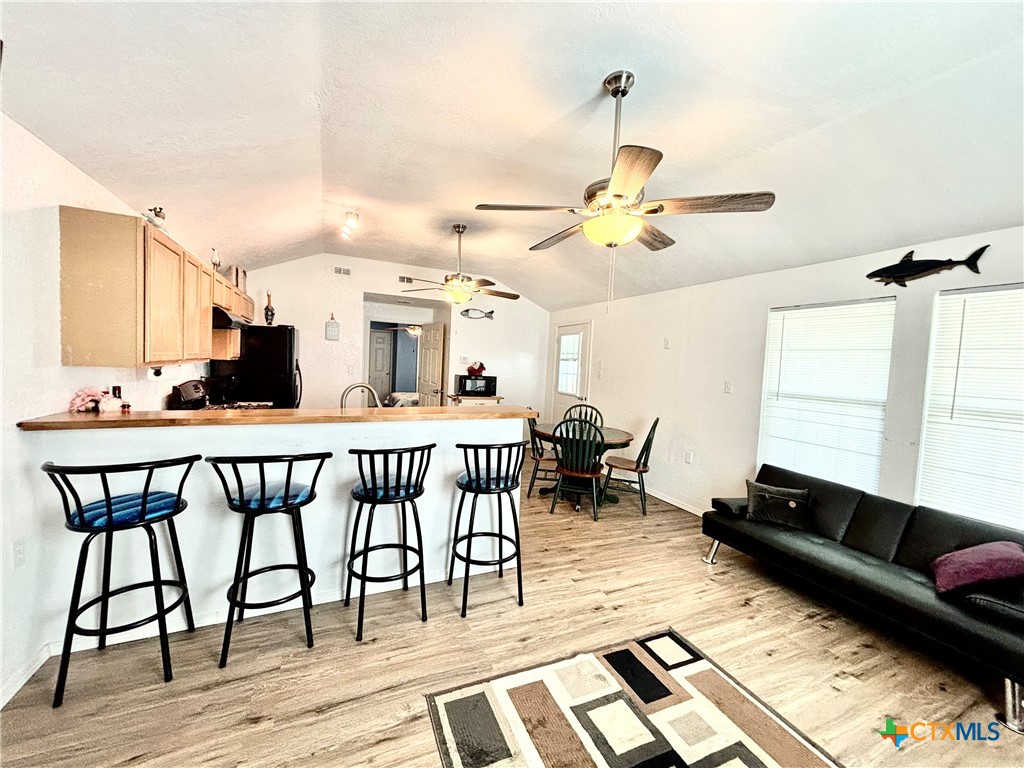 101 13th Street Seadrift, TX 77983 - Photo 30 of 42 a living room with furniture and a window