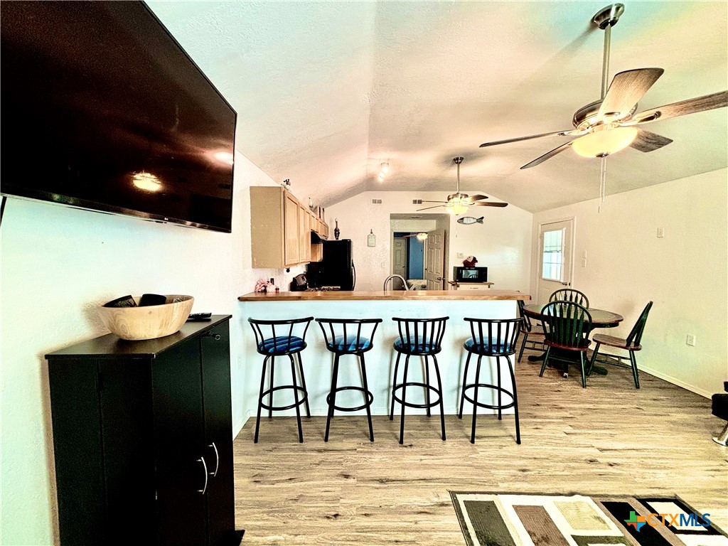 101 13th Street Seadrift, TX 77983 - Photo 8 of 42 a dinning table and chairs in the patio