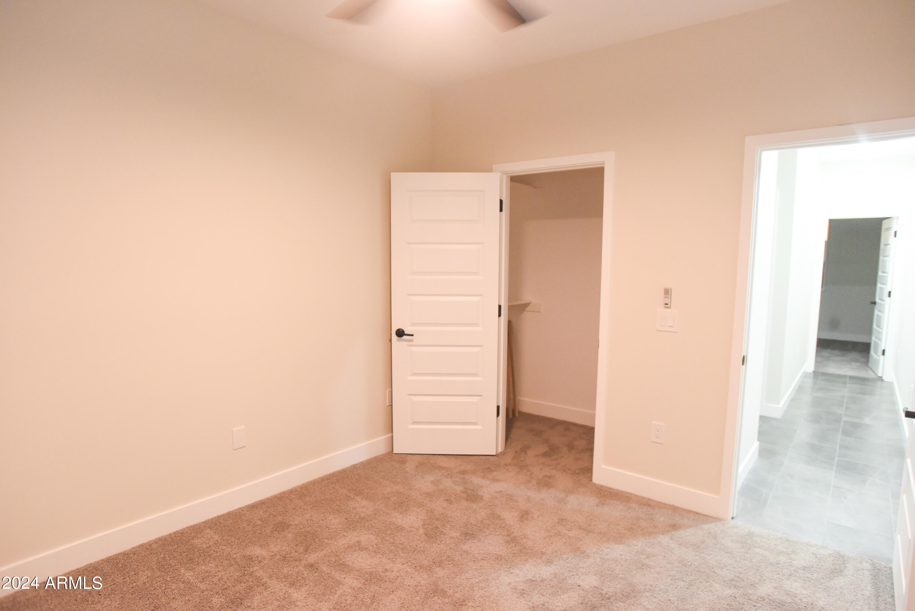 1028 South Wintersburg Road Tonopah, AZ 85354 - Photo 31 of 48 an empty room with an empty space