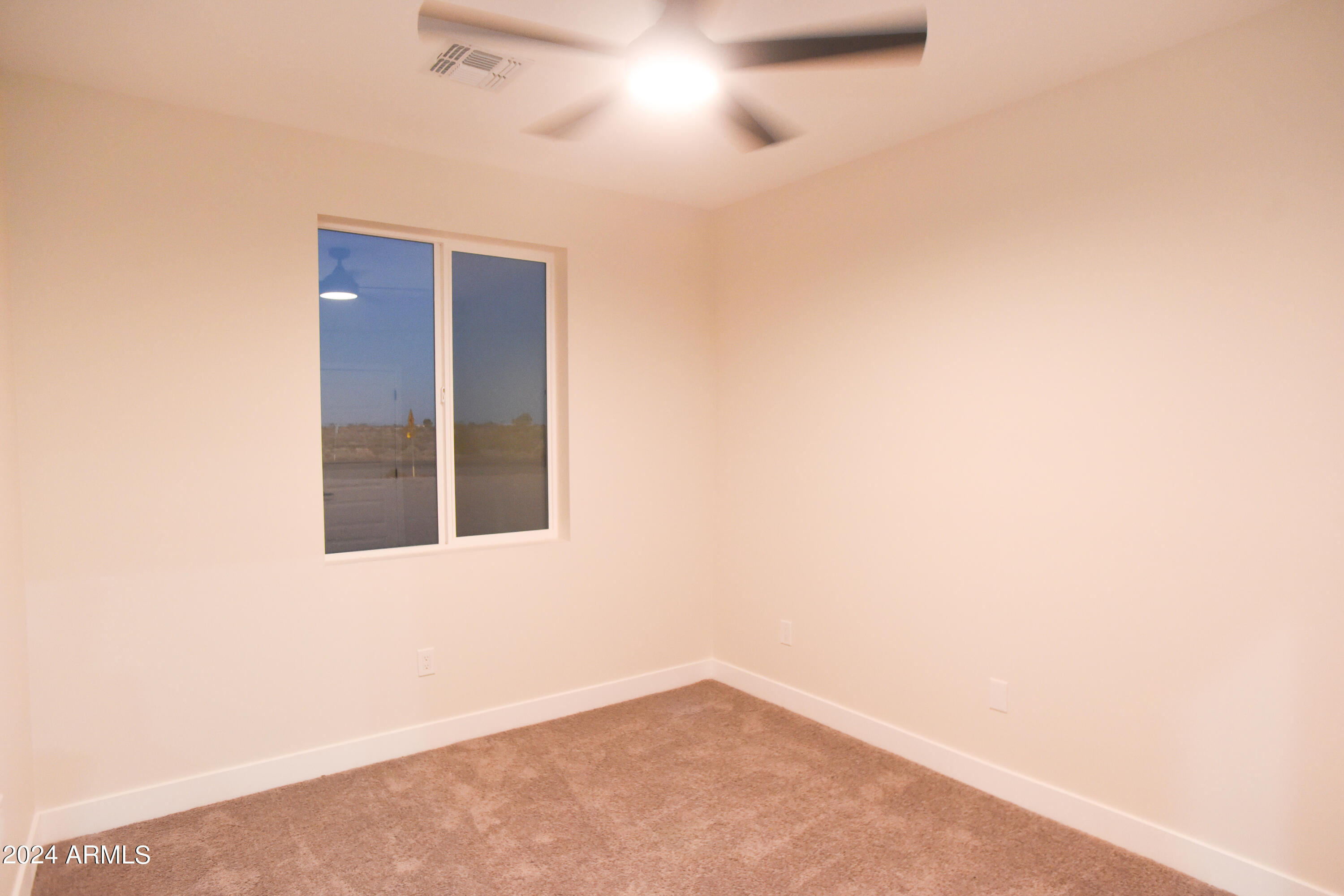 1028 South Wintersburg Road Tonopah, AZ 85354 - Photo 36 of 48 a view of an empty room
