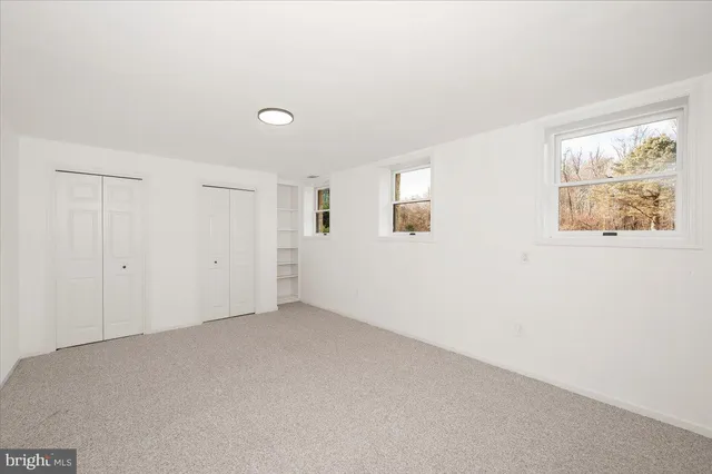 a view of swimming pool with a yard