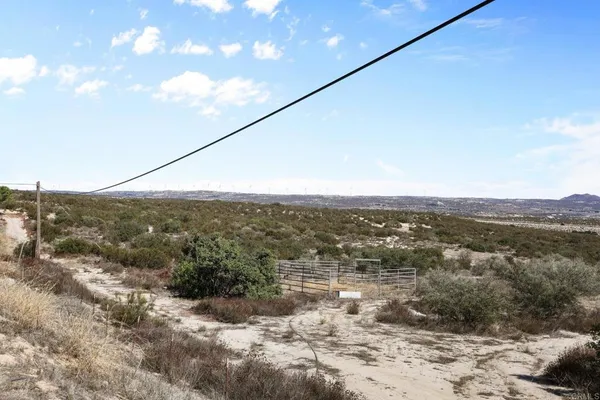 a kitchen with a sink and a refrigerator