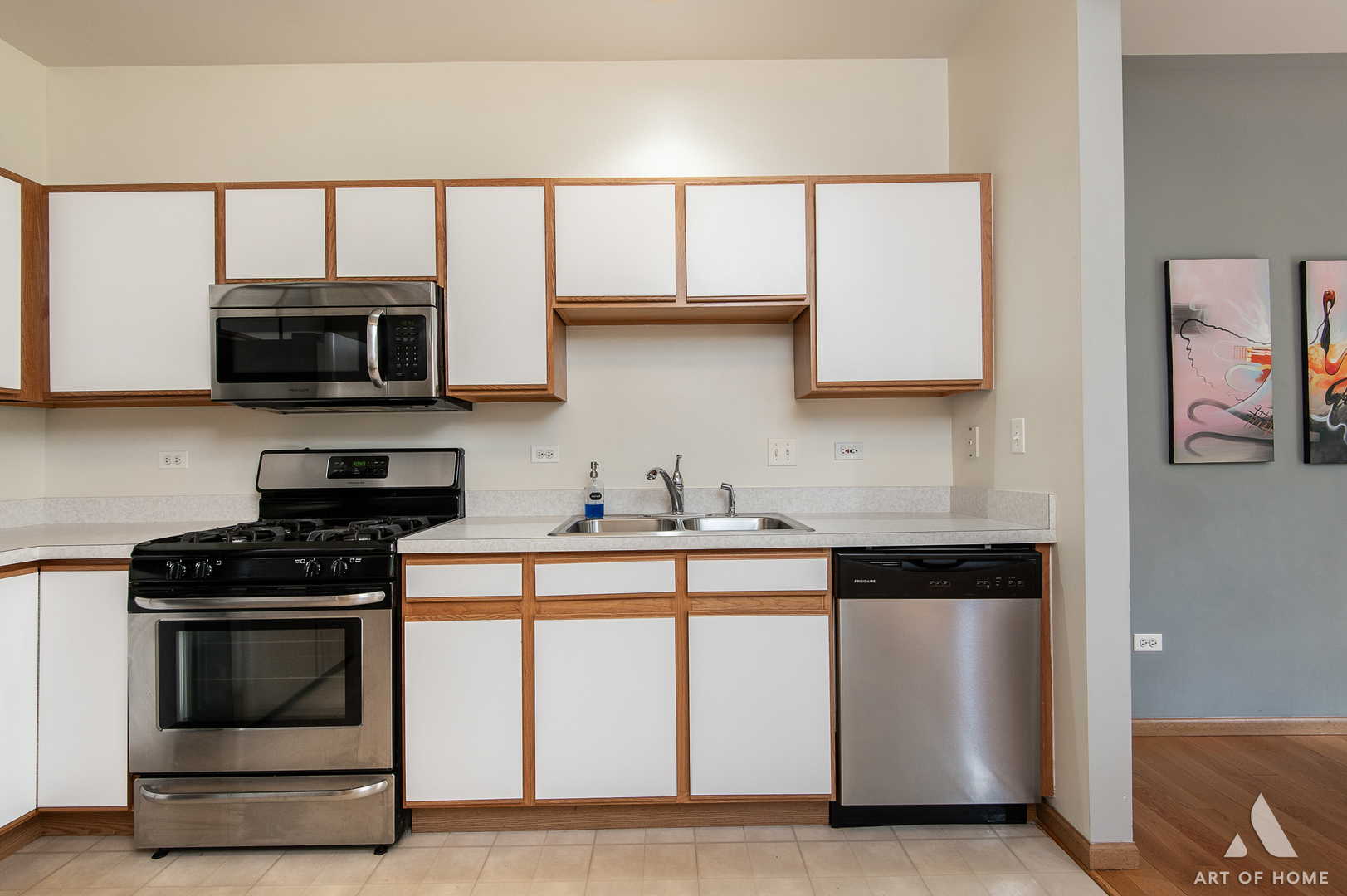 397 Littleton Trail Elgin, IL 60120 - Photo 11 of 30 a kitchen with stainless steel appliances granite countertop a stove and a microwave
