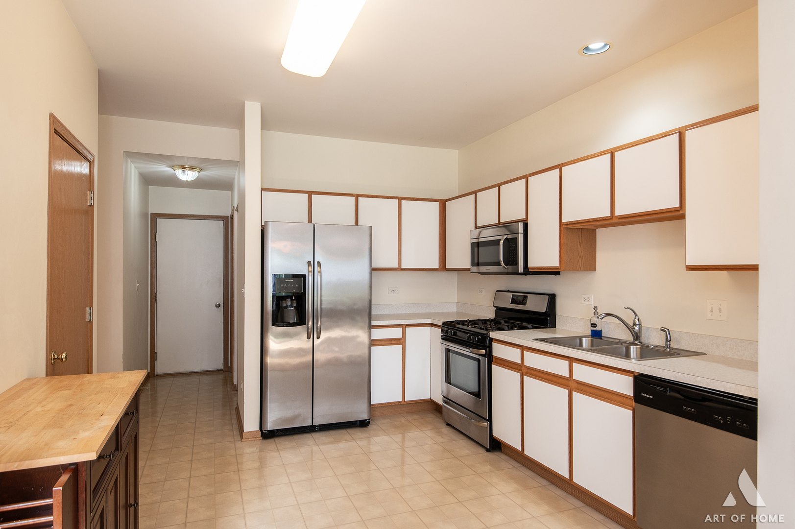 397 Littleton Trail Elgin, IL 60120 - Photo 10 of 30 a kitchen with stainless steel appliances granite countertop a refrigerator and a sink